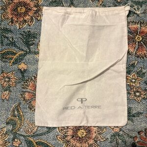 Pied A Terre White Dust Bag